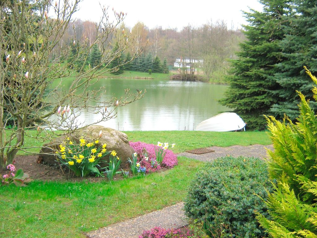 Haus am Kojenteich - Whg. 1 - Klosterdorf Cismar - gepflegte Wohnung auf idyllischem Seegrundstück