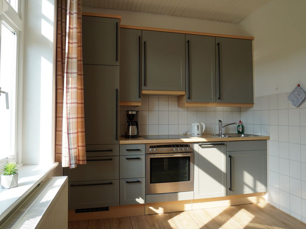 Pension Hilligenlei  Wohnung Langeness