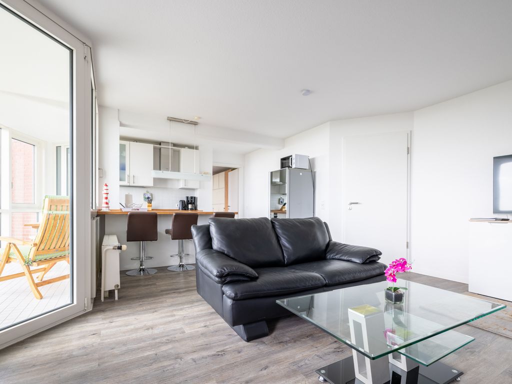 Komfortable Ferienwohnung für 2 am Südstrand mit Wintergarten & Meerblick | Wohnung 12
