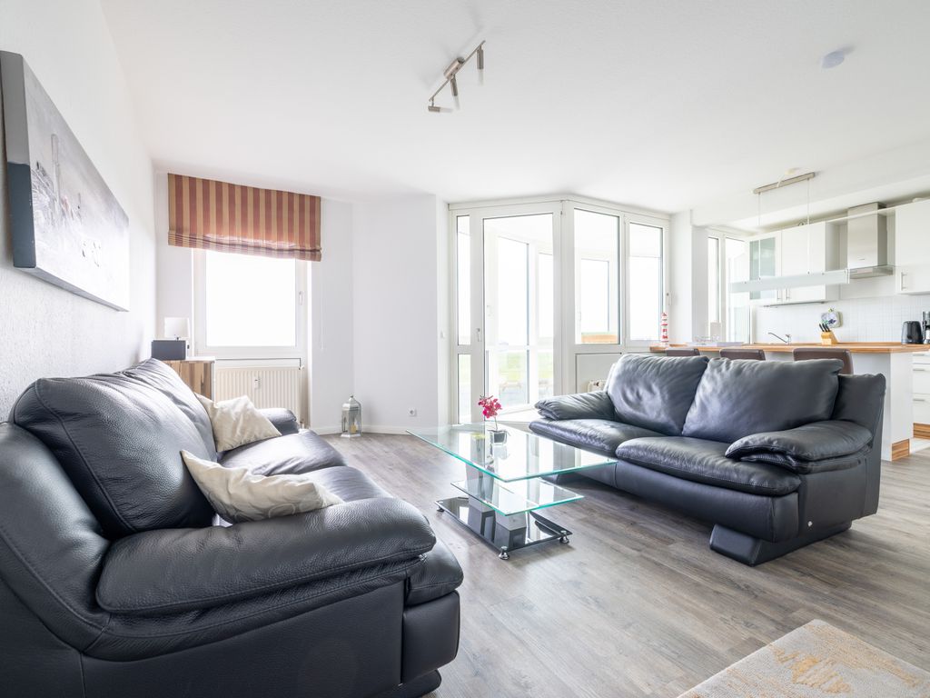 Komfortable Ferienwohnung für 2 am Südstrand mit Wintergarten & Meerblick | Wohnung 12