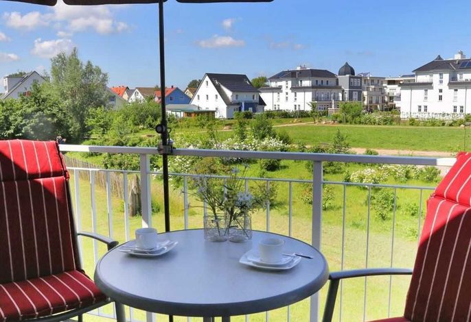 Photo Strandapartment – Meerblick trifft knisterndes Kaminfeuer 10