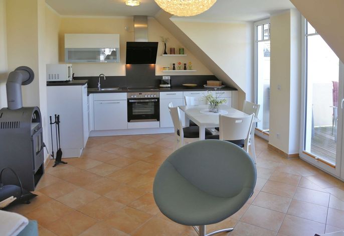 Photo Strandapartment – Meerblick trifft knisterndes Kaminfeuer 8