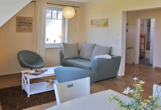 Photo Strandapartment – Meerblick trifft knisterndes Kaminfeuer 5