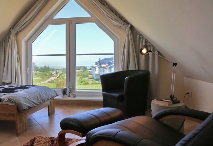 Photo Strandapartment – Meerblick trifft knisterndes Kaminfeuer 7