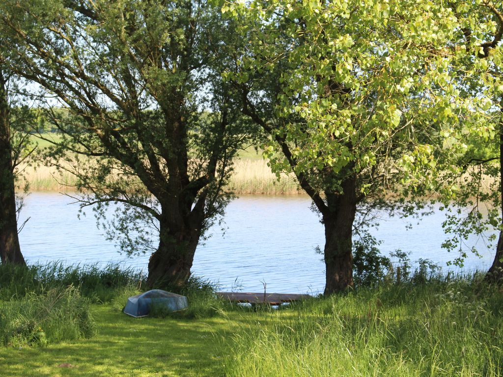 Reetdachhaus direkt am Wasser