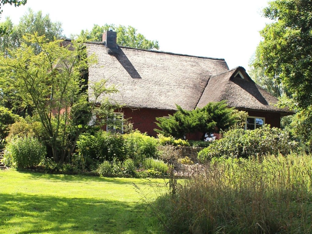 Reetdachhaus direkt am Wasser