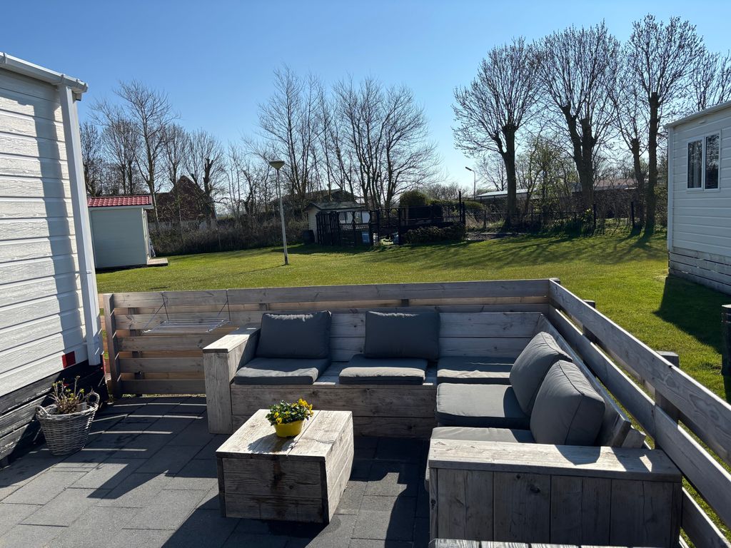 Neues, ruhiges Ferienhaus Nr. 46 Chalet  mit Meerblick 100 Meter zum  Wattenmeer, komplett eingezäunt