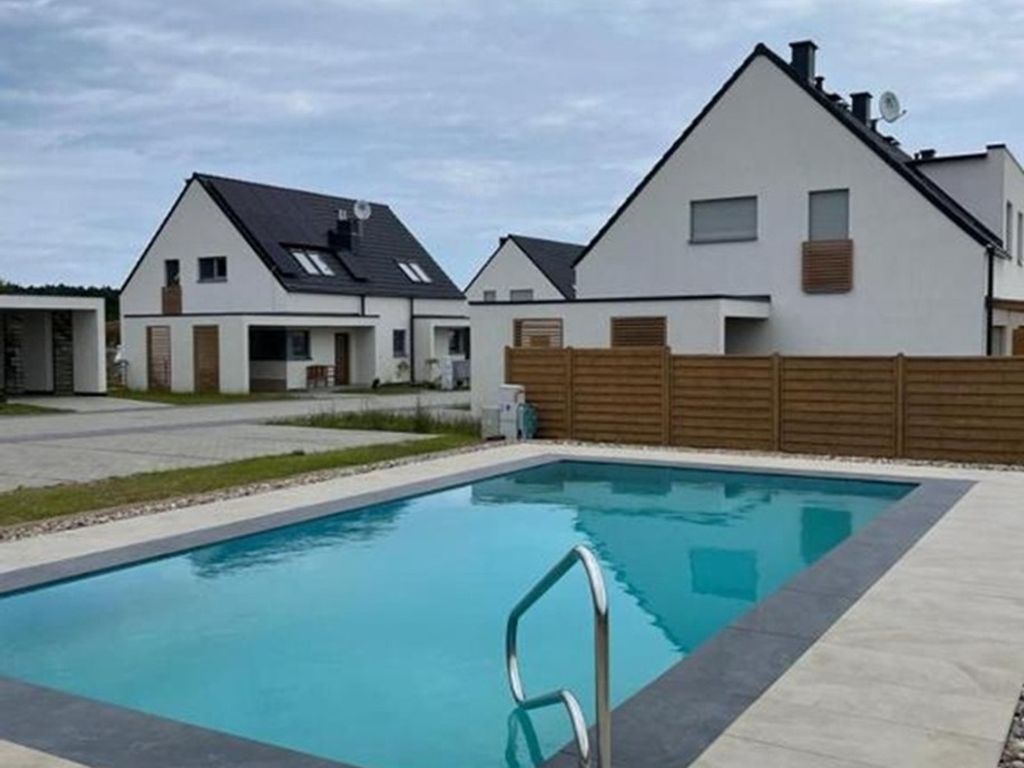 Ferienhaus Lilja mit Garten, Kamin und Pool