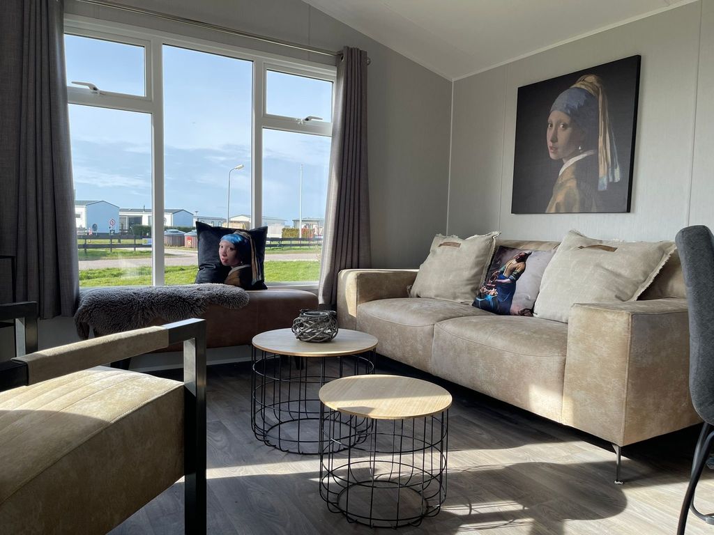Neues Ferienhaus Nr. 47 mit Meerblick 100 Meter zum  Wattenmeer, eingezäunt, hundefreundlich