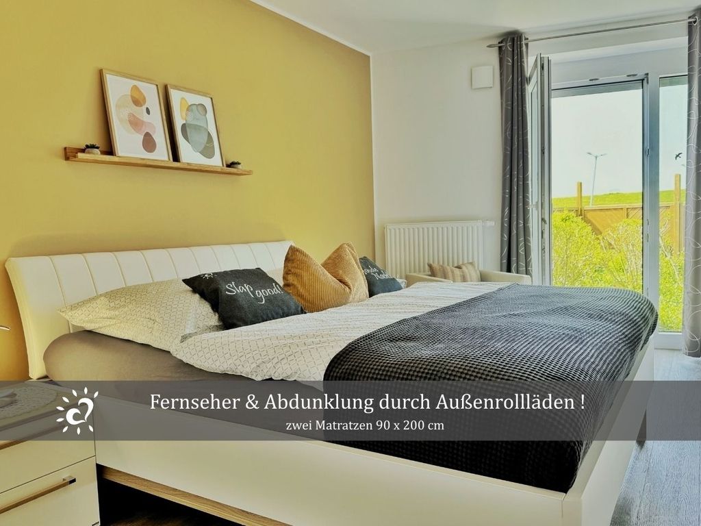 Ferienwohnung De Tuunkrüper mit Deichblick Nordseeluft von der Terrasse aus