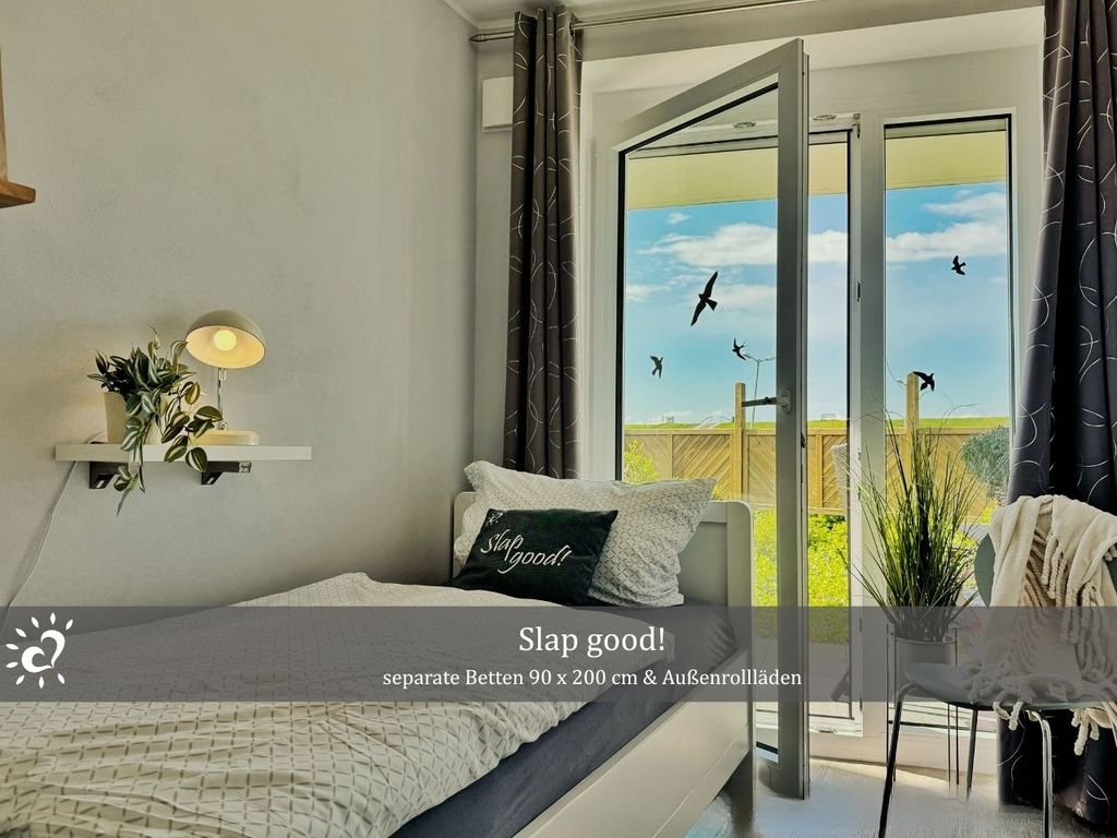 Ferienwohnung De Tuunkrüper mit Deichblick Nordseeluft von der Terrasse aus