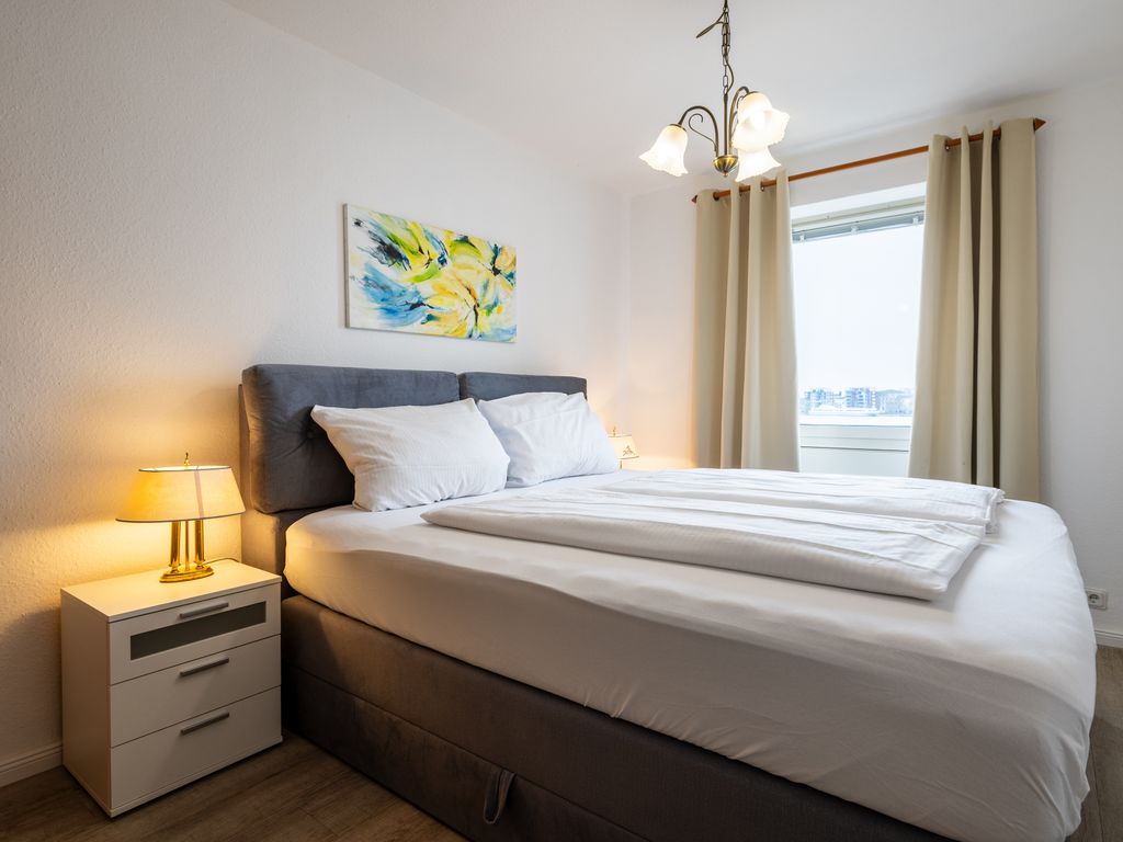 Exklusive Ferienwohnung am Südstrand mit Meerblick & Balkon | Wohnung 10