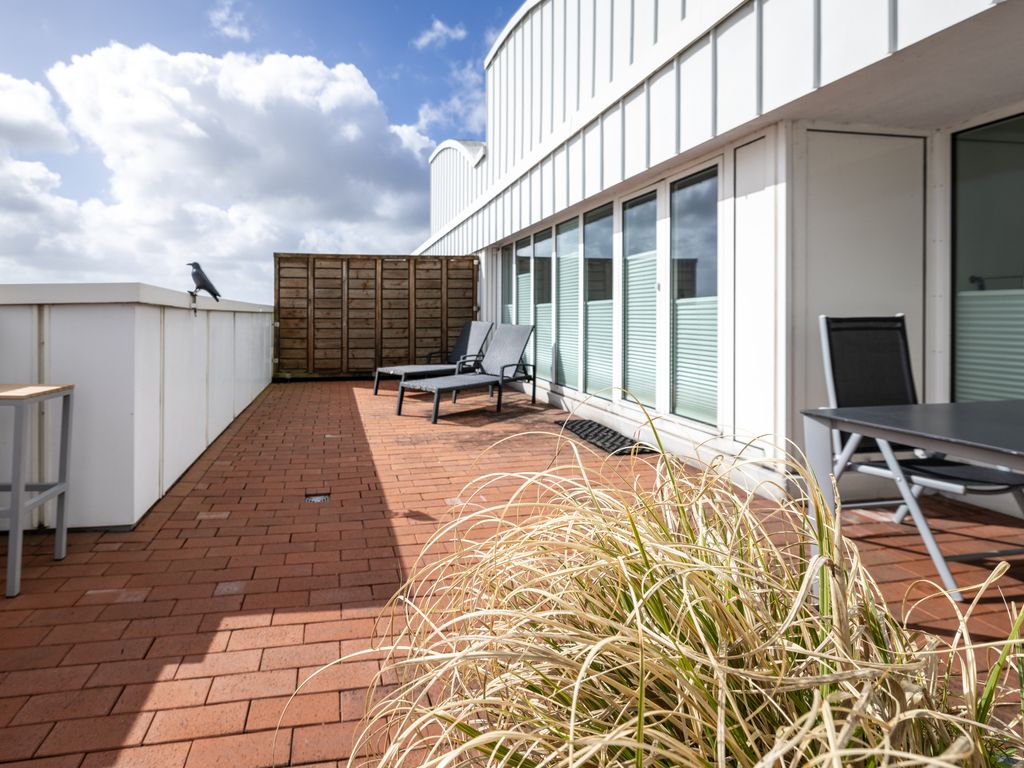 Exklusives Penthouse am Südstrand mit Dachterrasse & Meerblick | Wohnung 37