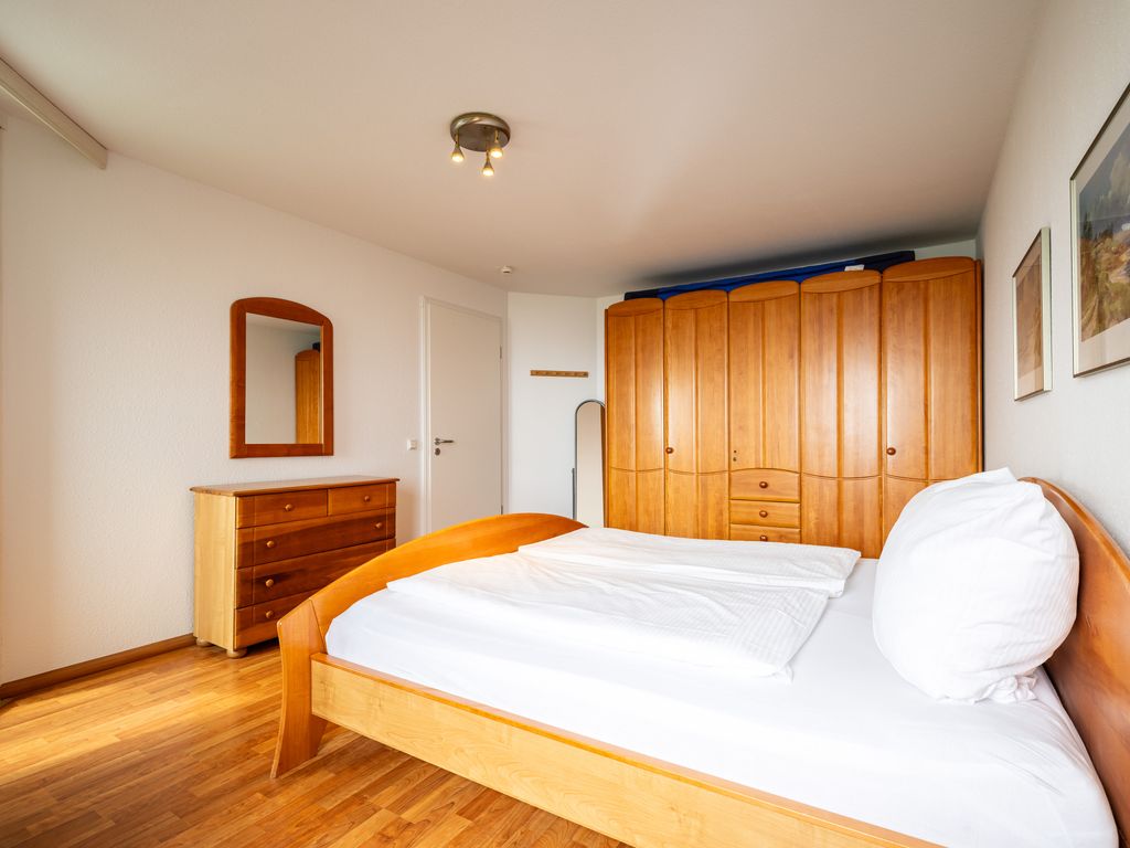 Gemütliche Ferienwohnung mit Wintergarten & Meerblick am Südstrand | Wohnung 123