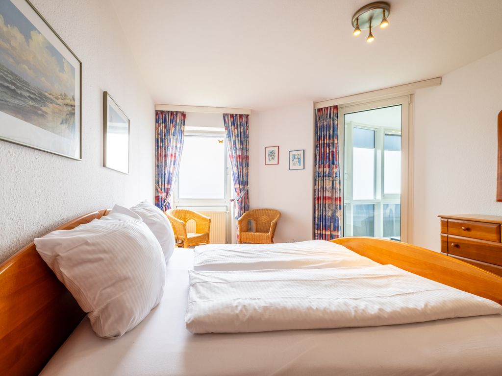 Gemütliche Ferienwohnung mit Wintergarten & Meerblick am Südstrand | Wohnung 123
