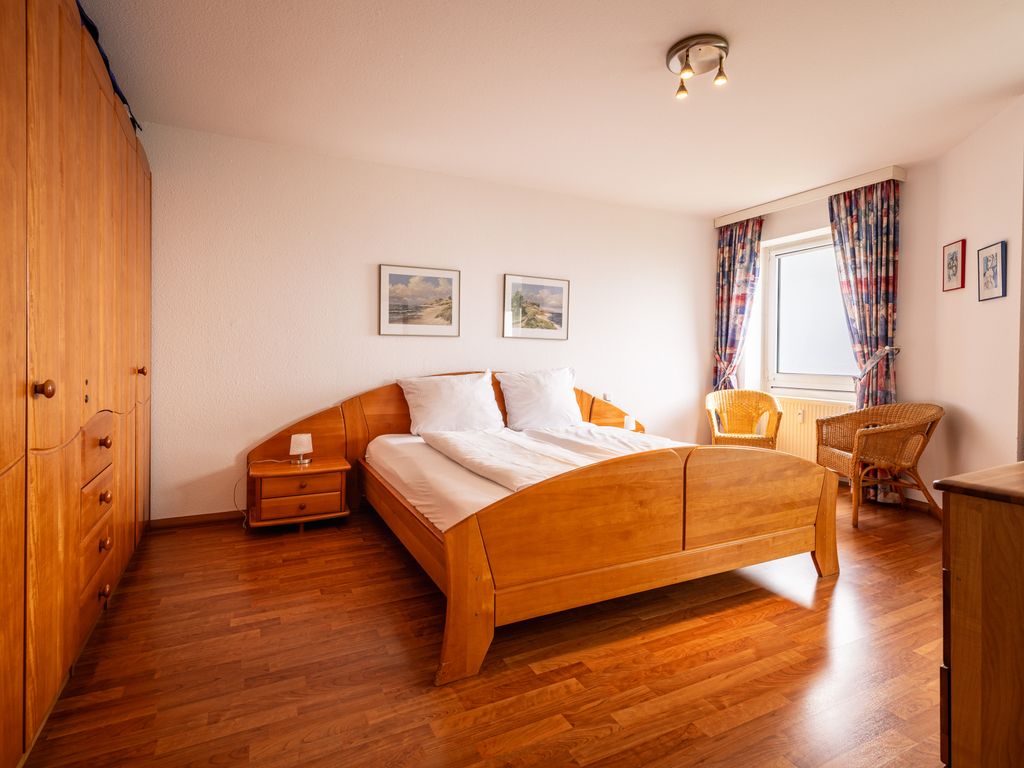 Gemütliche Ferienwohnung mit Wintergarten & Meerblick am Südstrand | Wohnung 123