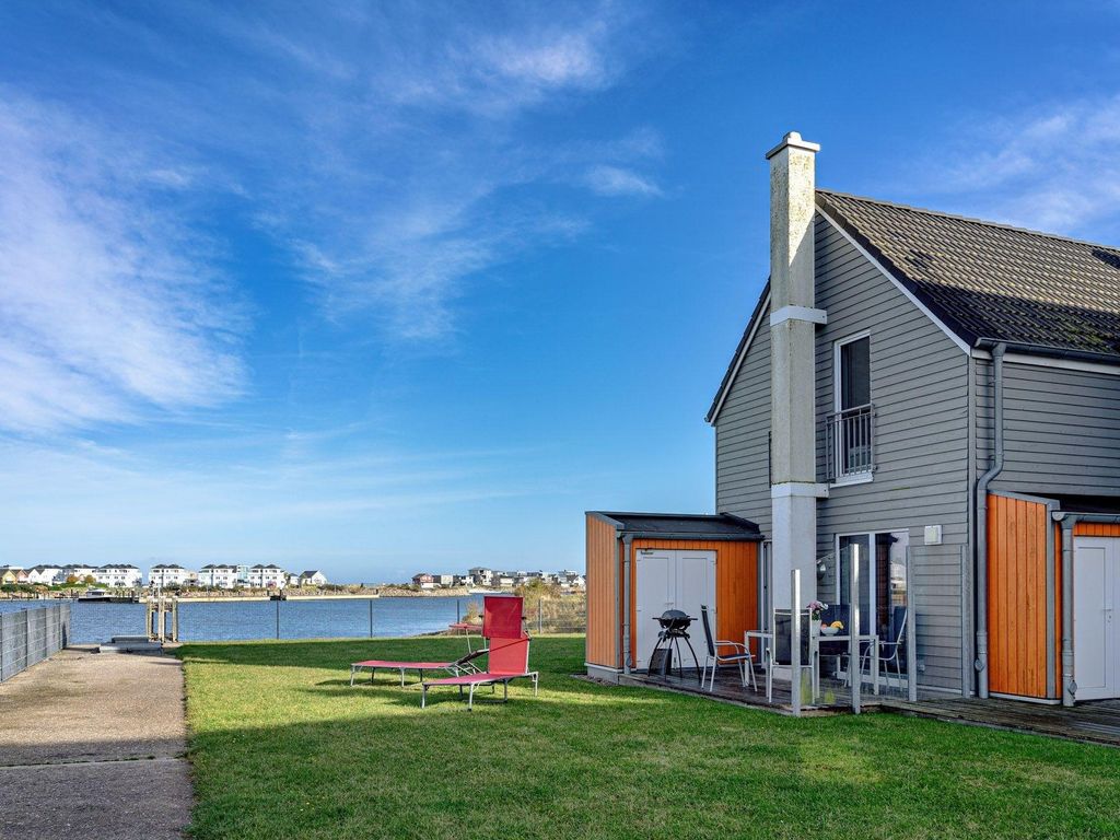 Ferienhaus Am Meer by Seeblick Ferien ORO, direkte Wasserlage,Sauna,Kamin