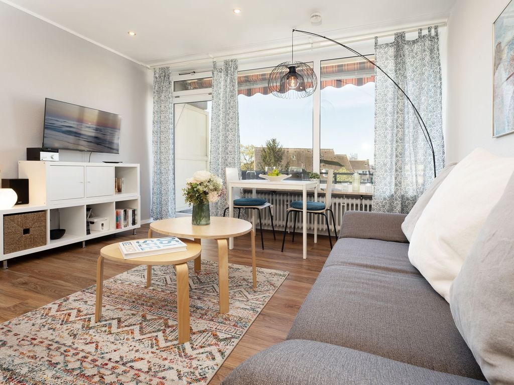 Seeschlösschen Grömitz: Wohnbereich einer Ferienwohnung