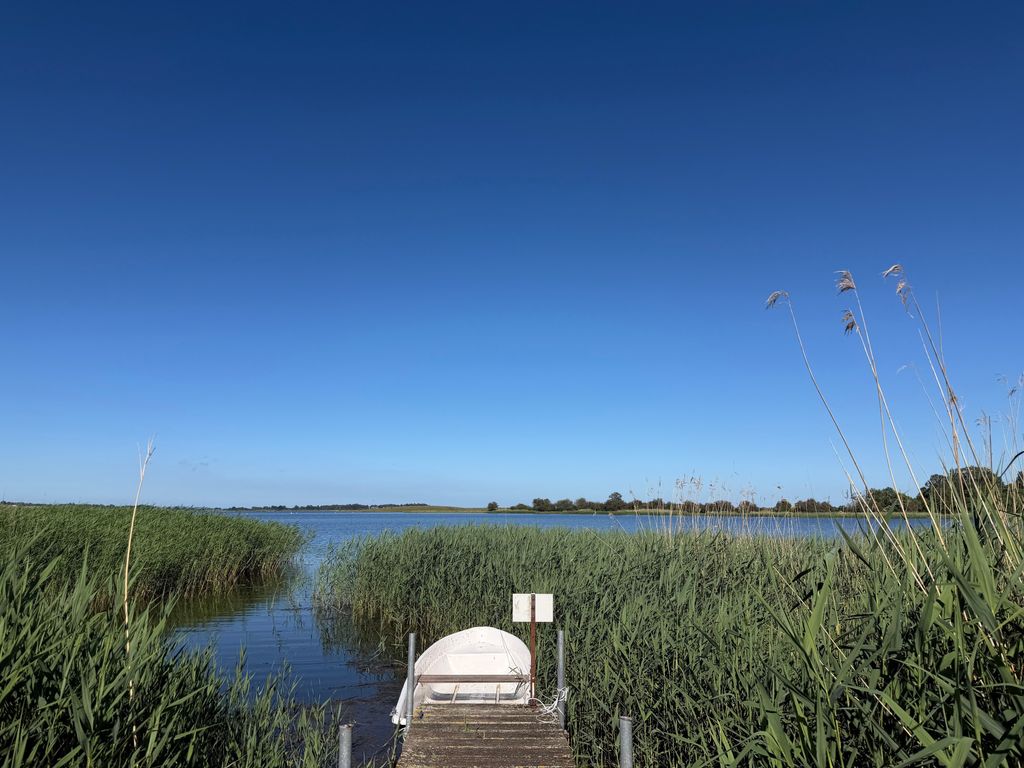 Familienferienhaus Rügenbrise - Gemeinsames Urlauben mit Steg und Boot auf Rügen - alles inklusive und 5 Bäder