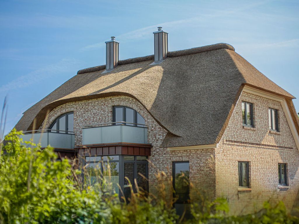 De Bööi – Luxus–Ferienhaus mit Meerblick, Sauna & Kamin