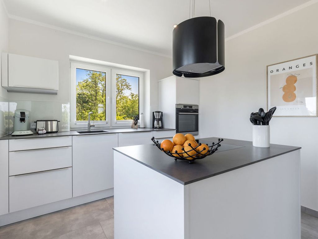 De Bööi – Luxus–Ferienhaus mit Meerblick, Sauna & Kamin