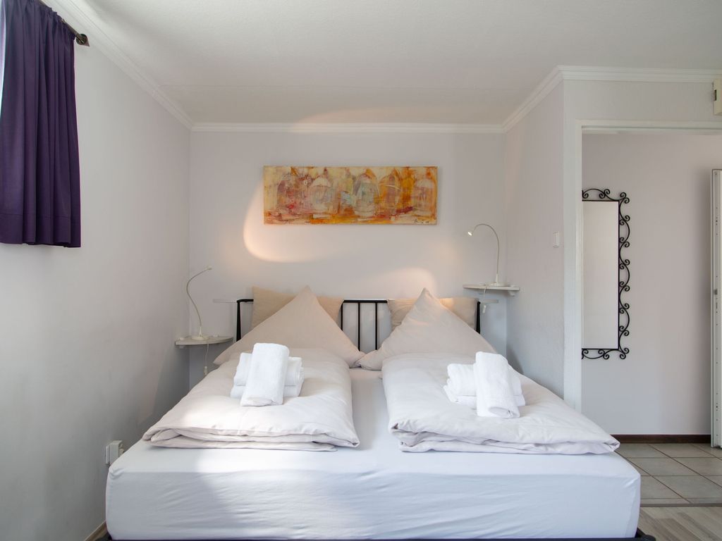 Gästehaus Daheim - Studio 09 mit Sitzecke im Freien