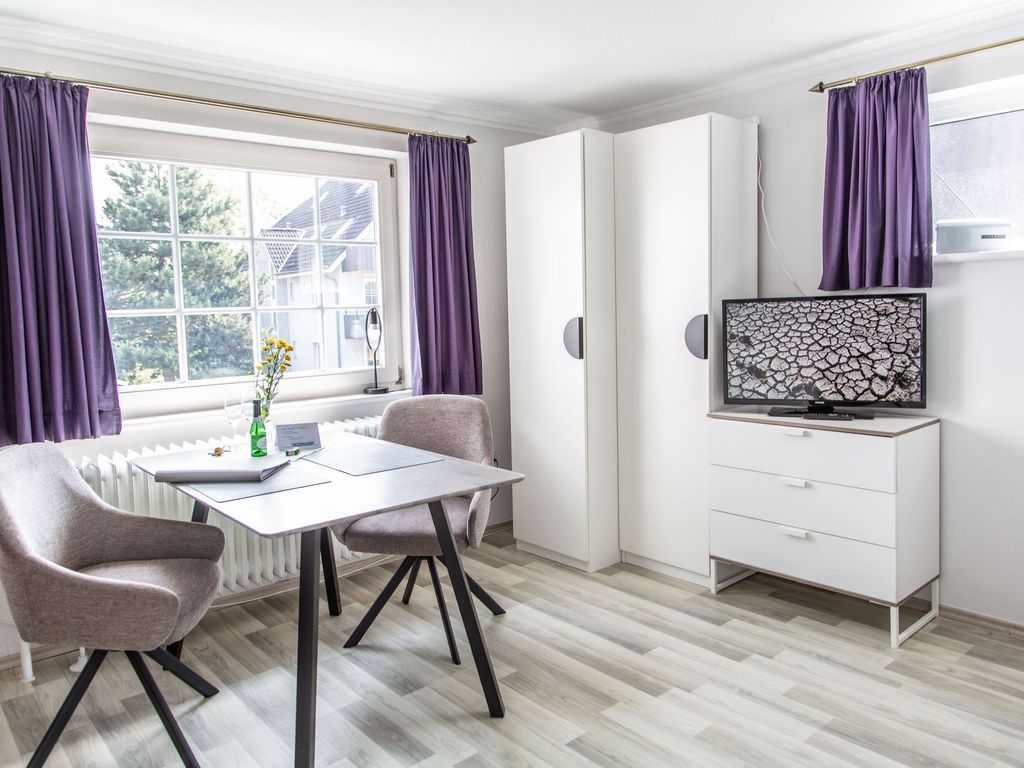 Gästehaus Daheim - Studio 09 mit Sitzecke im Freien