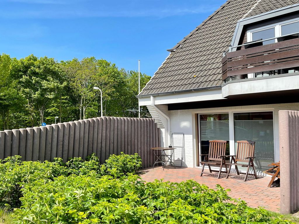 Ruusenhüs Westerland: Wohnbereich im weißen Landhausstil
