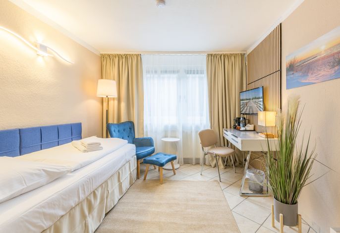 Ferienhaus Am Leuchtturm, Ferienzimmer 1 "Möwe" – Foto 1
