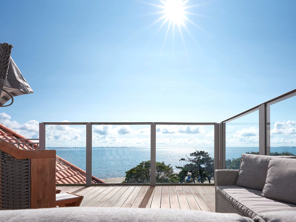 Schloss am Meer Wyk: Wohnbereich einer Ferienwohnung