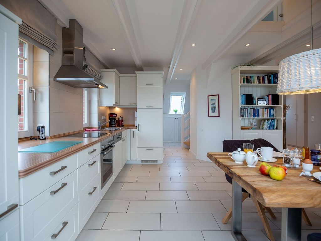 Haus Südstrand Wyk: Küche einer Ferienwohnung