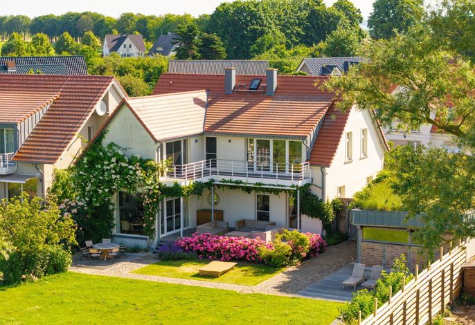 Photo Ferienhaus Peeneblick - exklusives Traumhaus in Direktlage am Wasser mit Bootssteg und Aussensauna 4