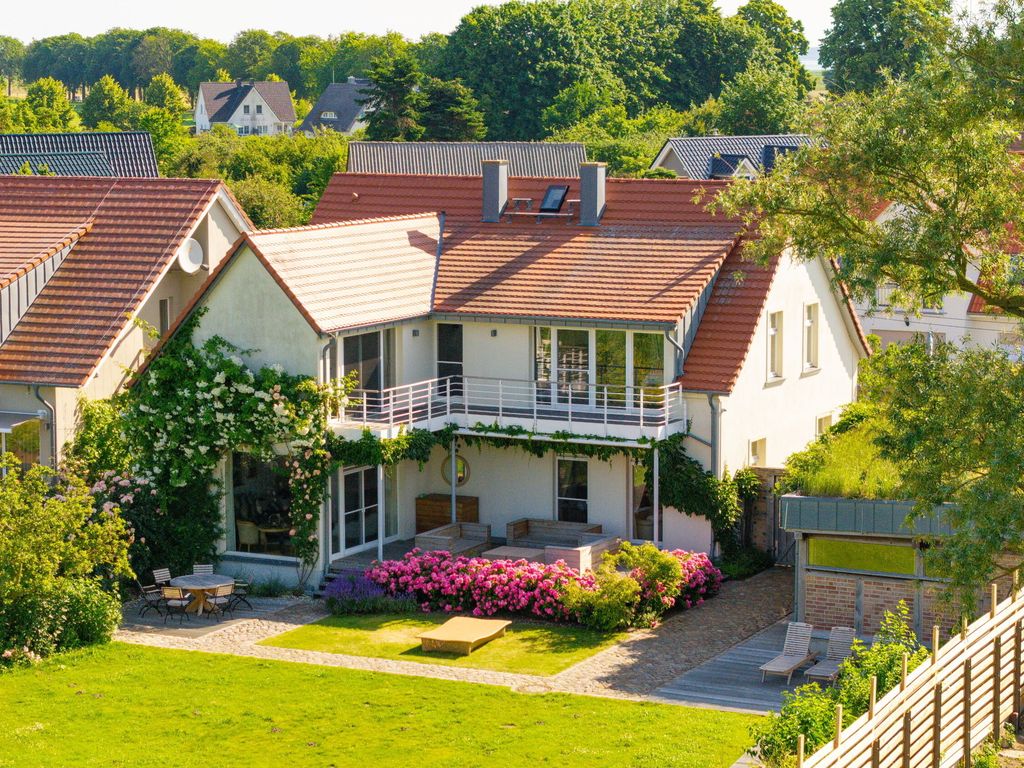 Ferienhaus Peeneblick - exklusives Traumhaus in Direktlage am Wasser mit Bootssteg und Aussensauna