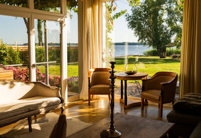 Photo Ferienhaus Peeneblick - exklusives Traumhaus in Direktlage am Wasser mit Bootssteg und Aussensauna 6