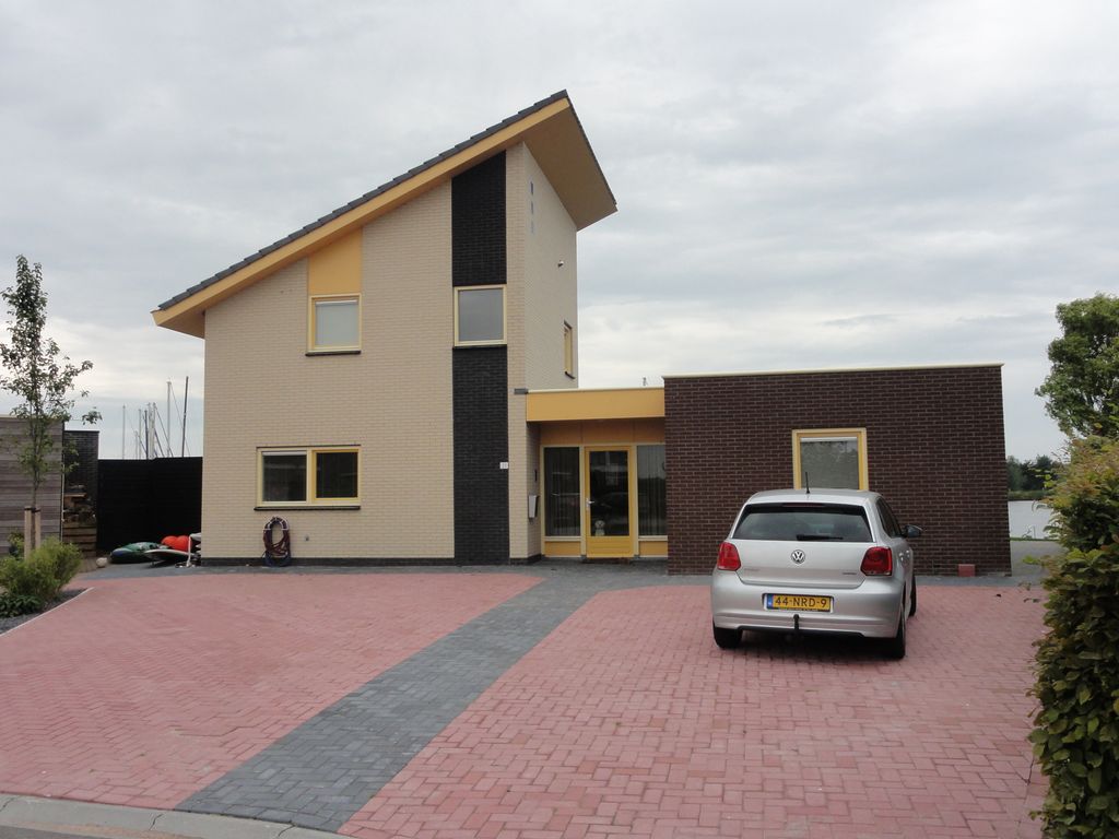 Vakantievilla Koudum met privé steiger