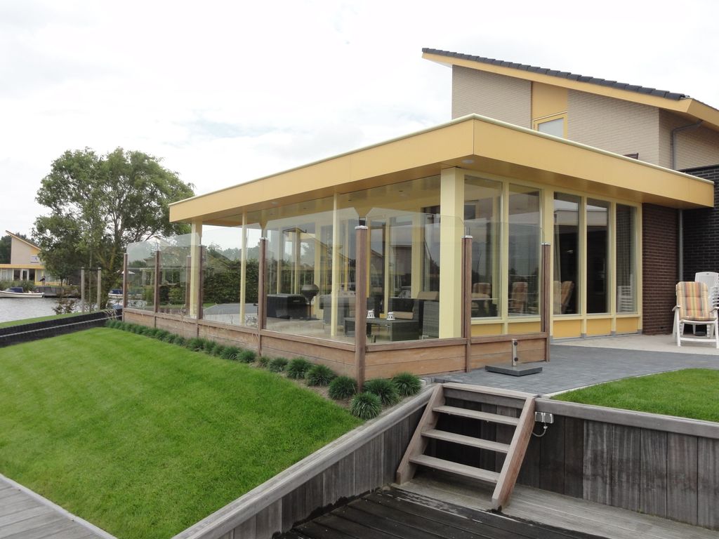 Vakantievilla Koudum met privé steiger