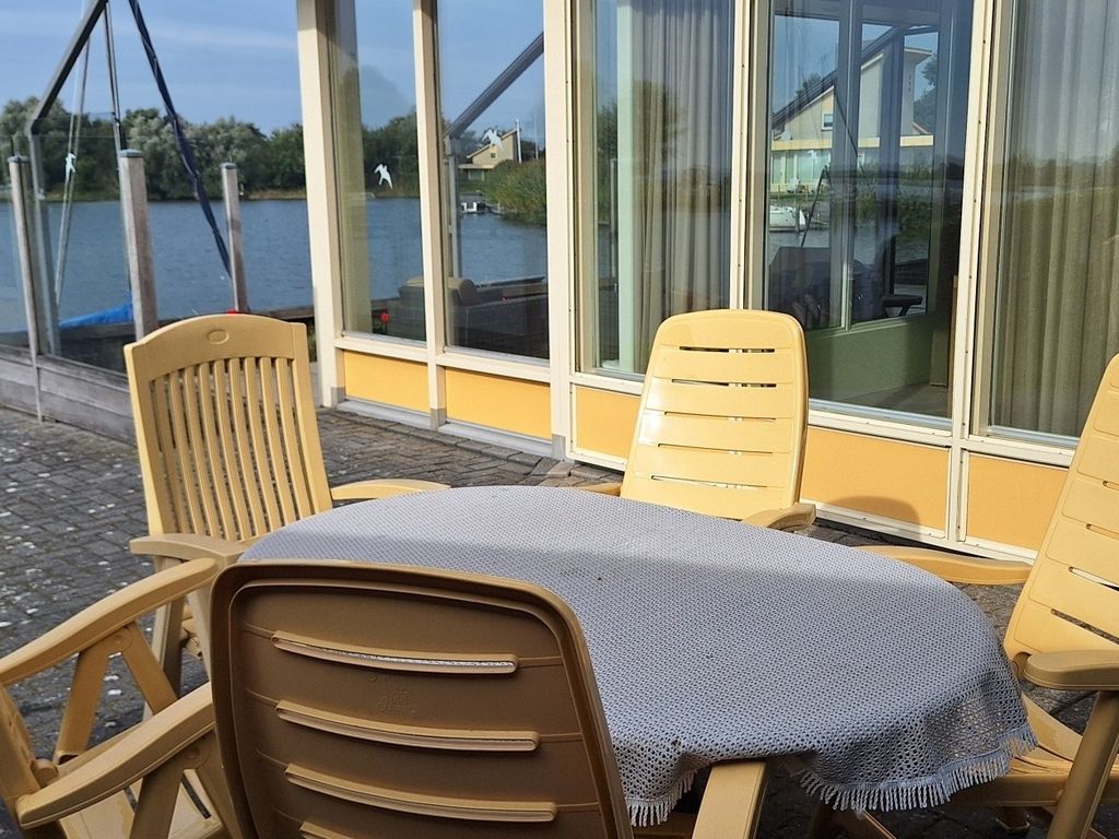 Vakantievilla Koudum met privé steiger