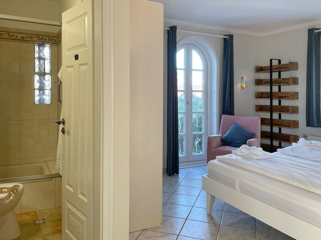 Huus Lüttenblick Wyk: Küche einer Ferienwohnung