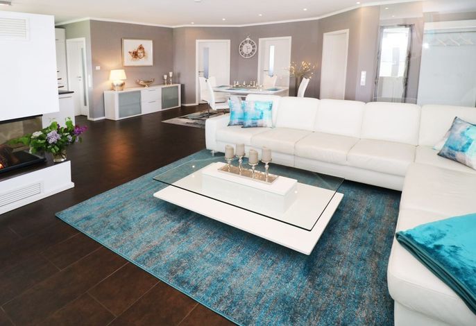 Photo Ferienhaus Lady Lounge – Kaminzauber & Erholung – Hunde willkommen 1
