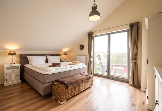 Photo Strand Resort - Ferienwohnung 54 Grad Nord - Graswarderweg 2 - 4GW271 10