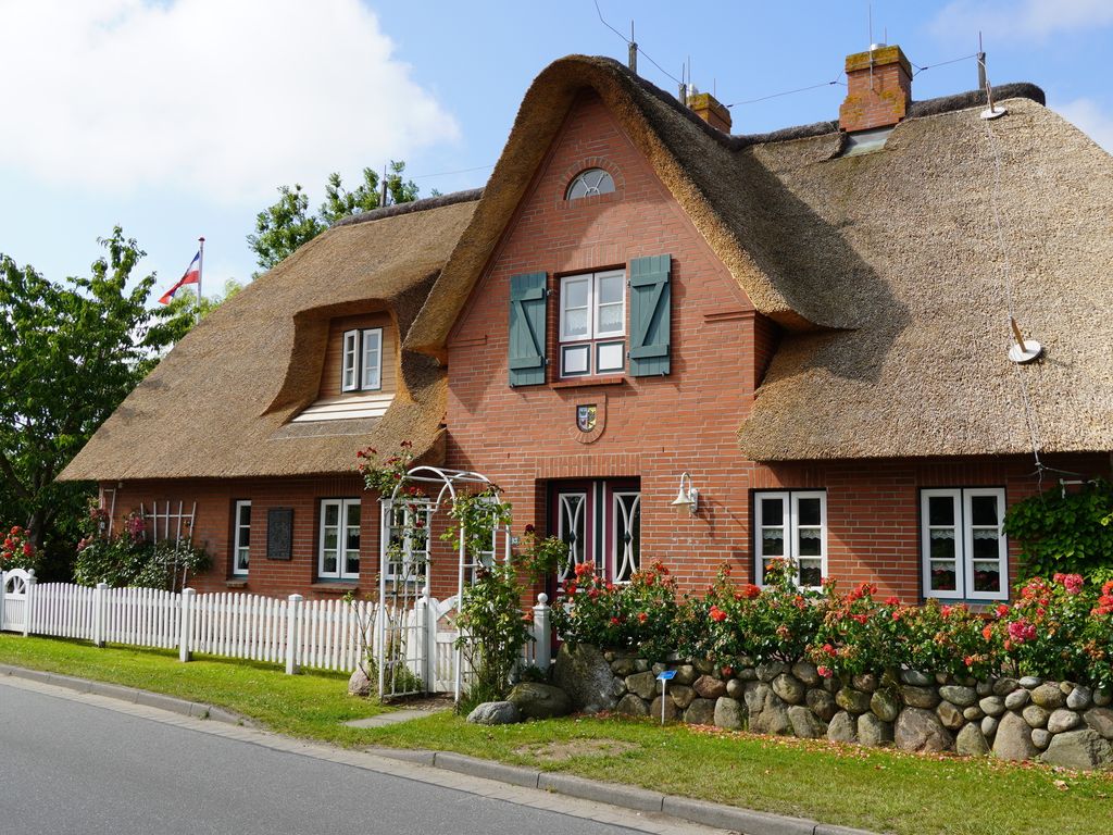 Ferien unterm Reetdach Whg 02