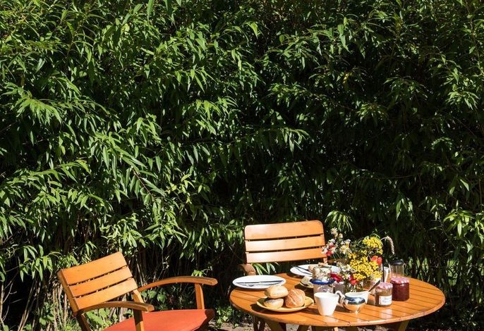 Photo Schönes Ferienhaus mit Garten & Mid Century Möbeln in Strand nähe Avendorf 6