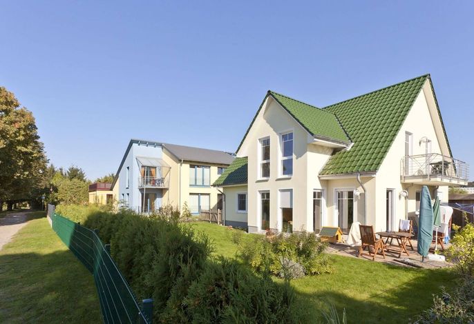 Elunia - Ferienwohnung mit Balkon, Garten und privatem Parkplatz in Heringsdorf