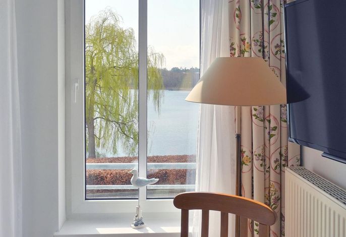 Hübsche Ferienwohnung in Strandlage mit wundervollem Blick auf den Schloonsee