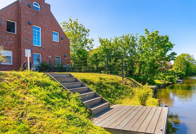 Erdgeschosswohnung (75qm) für 4 Personen und Hund mit Terrasse und Wasserzugang