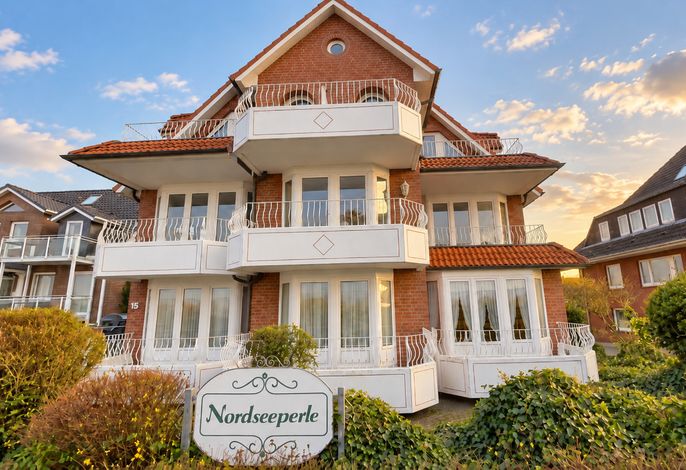 Nordseeperle Whg 4 - strandnahe Ferienwohnung direkt am Deich für bis zu 4 Personen