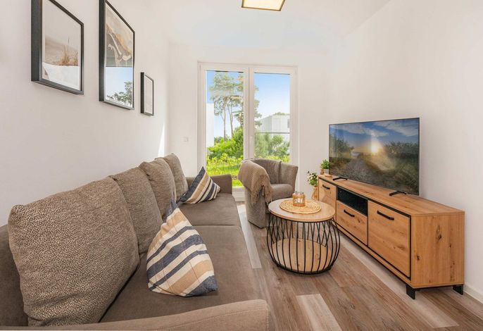 Moderne Ferienwohnung am Stettiner Haff mit Sauna und Spielbereich im Grünen
