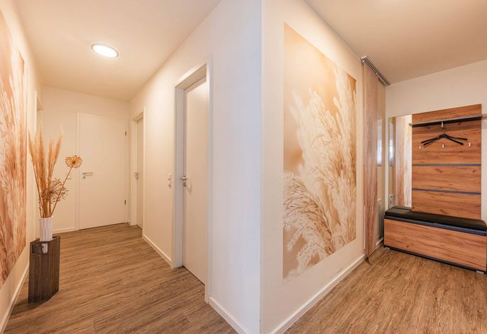 Photo Ferienwohnung Klippenblick mit Sauna, Kinderspielbereich und Fitnessraum 2