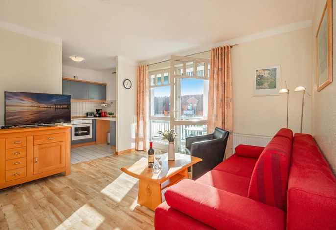 Gemütliche Ferienwohnung am Meer mit Balkon, WLAN & Parkplatz