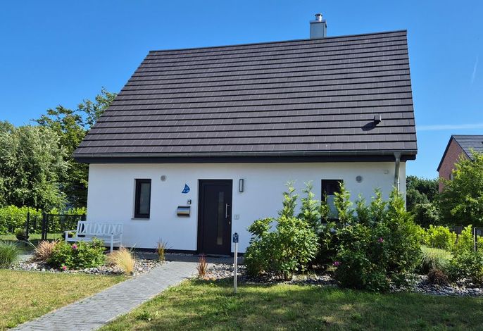 Ferienhaus „Elgin“ – Nordisches Wohngefühl, Sauna & eingezäunter Garten in Groß Schoritz